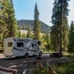 More than 13,000 private RVs and 1,600 state parks are open to RVs. This famous holiday business has a huge earning potential. Read this to help you decide if buying an RV lot is a good idea. An RV park business's money, costs, and position will be examined. Things To Look For When Getting An RV Park Initial Costs Prices for RV parks range from $50,000 to $3 million, depending on where they are located, how big they are, and what features they have. It's not just land you're paying for: ● Hookups for water and electricity. ● Putting down parking pads needs licenses and permissions. ● The cost of installing and building a septic system. Even though these fees seem high, the average RV park makes 10–20% ROI. At the end of this piece, profit expectations will be made. Location Based on where they are, RV parks either do well or not. The best parks are close to tourist spots, national parks, or other places where many people camp and visit. The RV park needs land that is flat and open. When RV drivers try to park on hills or rocky ground, they will need help. Since cars could get stuck, RV parks should be out of places likely to flood. If the river rises, a beautiful RV park on the bank of a river could become dangerous. Restrictions Check the local planning rules before you buy an RV park. Most RV parks are business or entertainment areas, but mobile homes and RVs could be used as extra housing if the park is in a household area. In any case, check with the local government before investing to ensure your RV park will be allowed. Water And Electricity Check the land's gas, water, electricity, sewage, and public services. Getting them to your RV costs a lot if you need to fix them. Permission and authorizations for planning are required. How Do I Invest In RV Lots? Buying an RV park is the easiest way to invest in RV lots and make money from camping. There are other ways to do it. Many builders sell RV lots that buyers can use however they want. There are RVers living there, but you can rent it out to make money. To make money, buy a house and rent it out to RVers in a popular vacation spot where sites are hard to come by. If you rent out your RV to guests who don't have a van but want to experience what an RV is like, you could make a lot of money. Guests can pick up your van even if the RV lot isn't there. Promoting Your RV Park Marketing is essential whether you buy an RV park or build one yourself. Here are some quick ideas for making a great marketing plan for your RV park. Make A Fantastic Website Even if you put your RV park on other websites, you still need a professional website that is easy for people to use. Make it easy to navigate and quick to load. Take pictures of your RV park to make it look good. There should be a lot of space between the text blocks. Make it easy to book on the site. Add a blog to your website to get more users, improve your SEO, and build respect in the community. Utilize Social Media Sites RV parks need to have social networks. Even though Facebook is the most well-known, you should use at least two or three others. Regular events and presents keep people interested. Tell people who post pictures of their holiday RV parks to use a hashtag. Share great photos and movies of parks. Tell people about events and places in your area. Think about paid ads on social media. Contact Local Businesses And Influencers. You can get more people to visit your RV park by teaming up with local small businesses and people with a lot of impact. For example, you could offer deals to food trucks or restaurants in your area. Use a local theme park or water park to get the word out. Support the outdoors and sports stores in your area. Let a well-known van life expert stay for free in exchange for a review or video. Focus On Online Reviews. Surprisingly, 93% of people who shop online read reviews first. With reviews, it's getting people to stay at your RV park. Is hard. Ask guests to leave reviews on social media sites and tell them to do so when they check-in. It's easier to find and book things when there are more reviews. Benefits Of Investing In An RV Park You Make Decisions: It's hard to run a campsite, but you're the boss. You decide when your campsite is open, how much it costs, and who can stay there. Recession-proof Profits: RV parks are better able to handle economic downturns than vacation homes and Airbnbs. Because they offer cheap places to stay, and demand increases when people are out of work. High Potential For Earnings It might take some time to build a name with RVers, but RV parks are a great way to make money. People stay at parks they like, so you'll have return customers. Seasonal It might sound bad, but spring, summer, and fall are your busy times. Winter is a great time to take a trip, visit family, or chill out. Cost-free Living People who own homes in RV parks can live there for free. The giant mortgage payments and sky-high home prices won't be a problem. Cons Of Investing In RV Parks Stressful It takes a lot of work to run an RV park. During the busy summer months, your guests will expect a great time. Get ready to work early, but you may hire people later. Potentially Unprofitable First Year. Depending on where you are, how you sell, and whether you own an RV park, you might not be able to break even in the first year. Since campers are loyal to parks, you will spend your first year building your brand and customer base. Make Your Skin Thick You'll need thick skin because you'll be around many people daily. You have to get rid of annoying guests sometimes and deal with complaints other times. You can expect hard decisions and angry guests. How Much Money Do RV Park Owners Make Each Year? Are RV parks an excellent way to spend money? As we already saw, the average RV park owner can expect a 10–20% return on investment. RV parks charge different amounts of money each night based on size, location, and room. You can make $50,000 to $90,000 a year if you make between $10,000 and $35,000. It's easy to make money because a primary RV park only costs about $50,000. Conclusion An RV park could be the best option for a unique way to make money. Their popularity, high return, and ability to weather economic downturns make them significant assets. But not everyone can use them. If you like to camp, there are better places than an RV park.